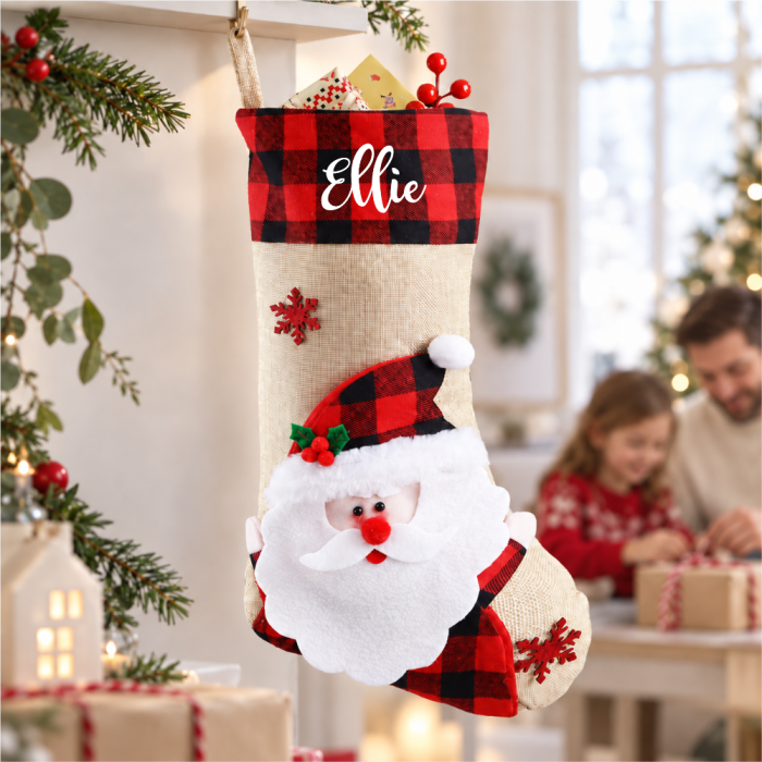 Santa Christmas Stocking with Embroidered Name photographed on a clean surface in daylight