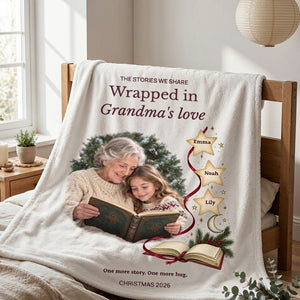 Personalized fleece blanket for Grandma draped over a wooden bed frame, lit by window light so the printed design reads clearly